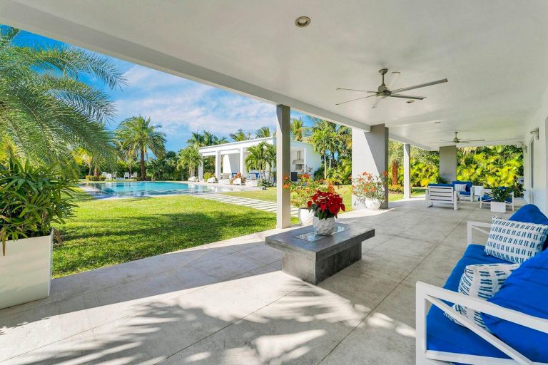 Covered patio overlooking the pool