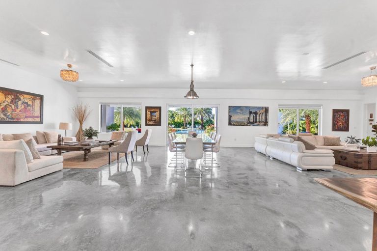 Wide open-concept great room connecting the living and dining spaces